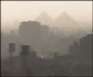 Panoramic view of Cairo with Giza pyramids in the distance